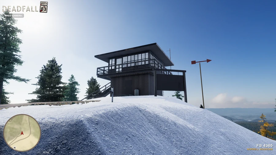 In-engine free-camera view: Snow-covered Morrell Lookout and its catwalk against the blue morning sky. Original minimap and location HUD remain visible.